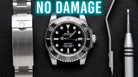 how to put a rolex watch on|how to take rolex bracelet off.